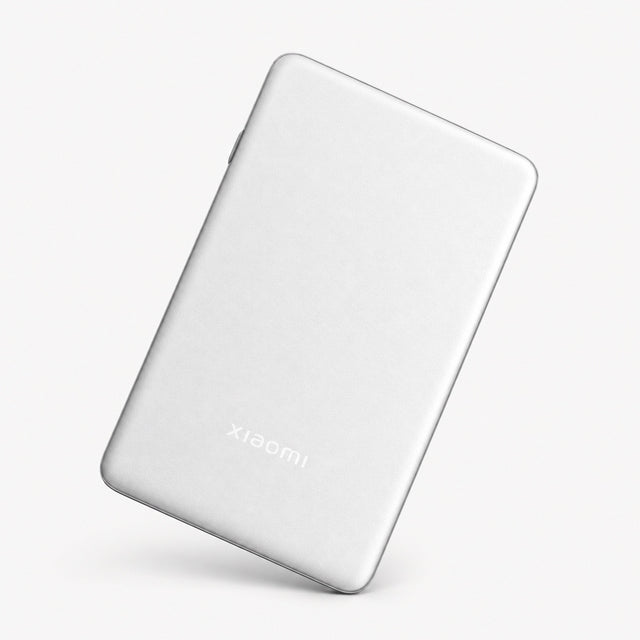 Portable photo printer Pro, white slim device with Xiaomi logo on the back.