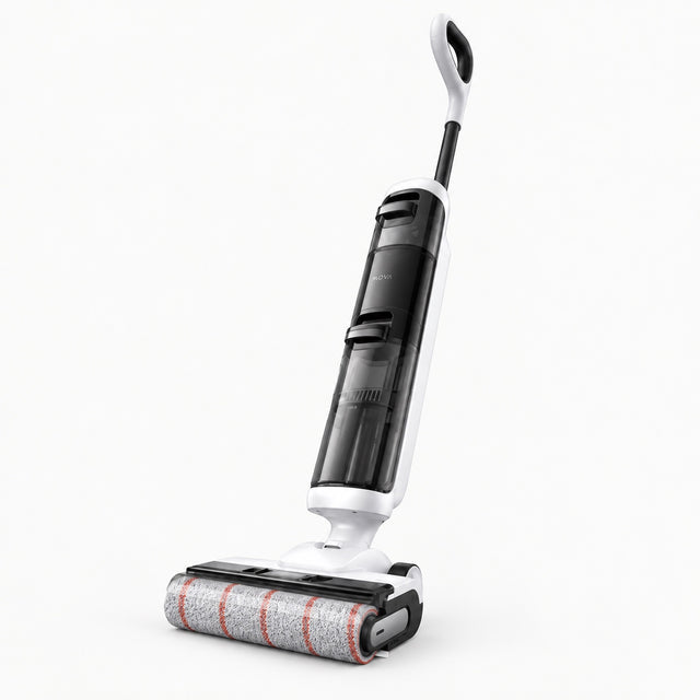 Wet and dry vacuum cleaner with upright handle and spinning roller floor brush.