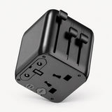 Black universal travel power adapter with multi-plug outlets and adjustable pins