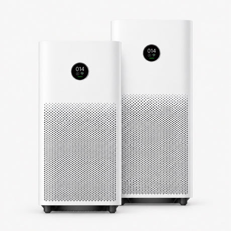 White air purifier with front grille and round display on top, two units side by side