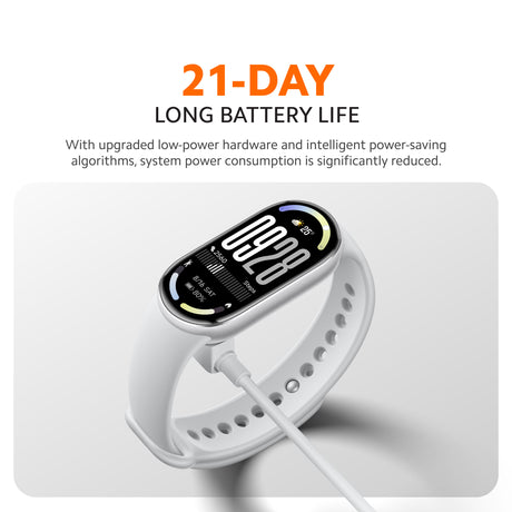 Fitness tracker with white strap and black screen bezel, shown at an angle