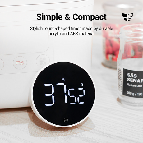 Kompakter Timer mit schwarzem LED-Display, runde Front mit M- und S-Anzeige