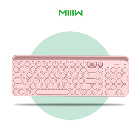 Wireless Bluetooth keyboard, light pink with full key layout and shortcut buttons